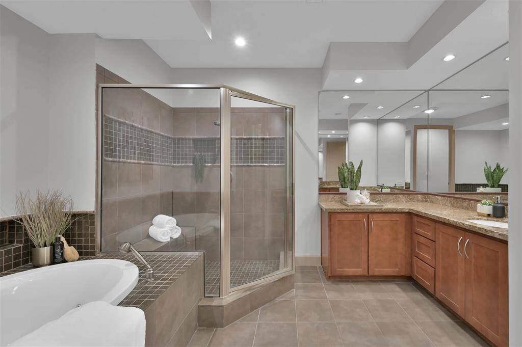 Master Bath Shower boasts dual vanities for added convenience and privacy