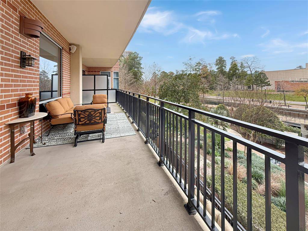 Extensive terrace that overlooks the waterway and The famous koi pond .