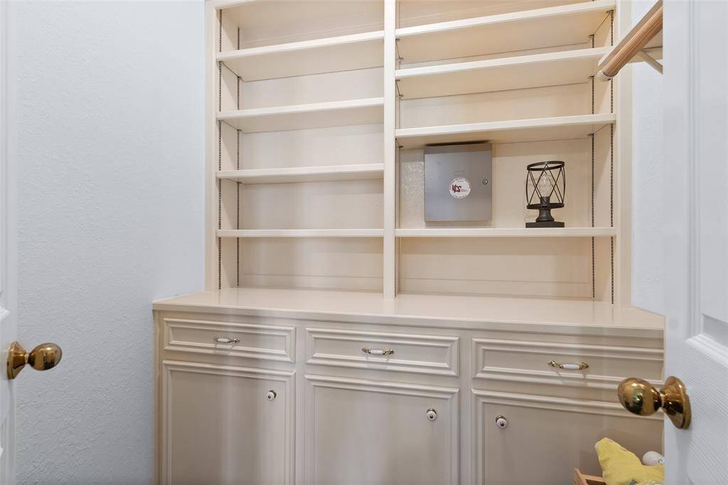 Spectacular built out closet in guest bedroom