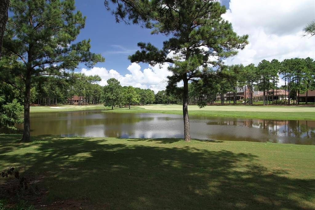 Peaceful ponds dot the golf course, offering picturesque fairway views.