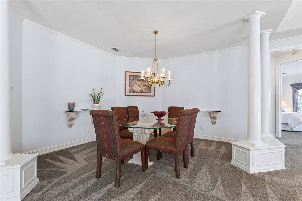 Formal dining area is open to living and kitchen. This is an excellent plan for entertaining or bringing friends and family together.