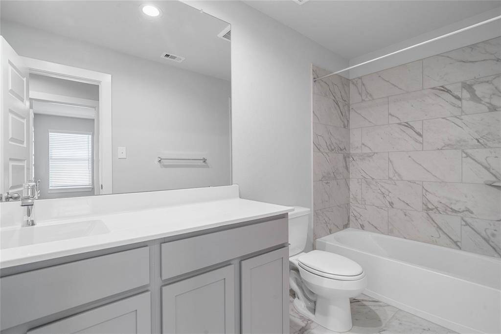 This photo is for illustrative purposes only and is not to be considered an exact replica of the finished home. Rendering does not match the finished product in terms of features, colors, landscaping, etc. Pricing, specifications, square footage and materials are subject to change at any time and without notice.