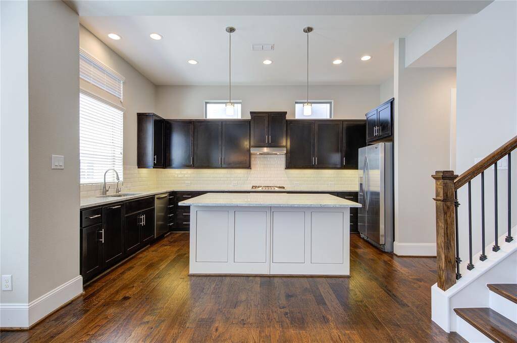 The drawer and cabinet hardware were a builder upgrade as well as the undercabinet lighting.