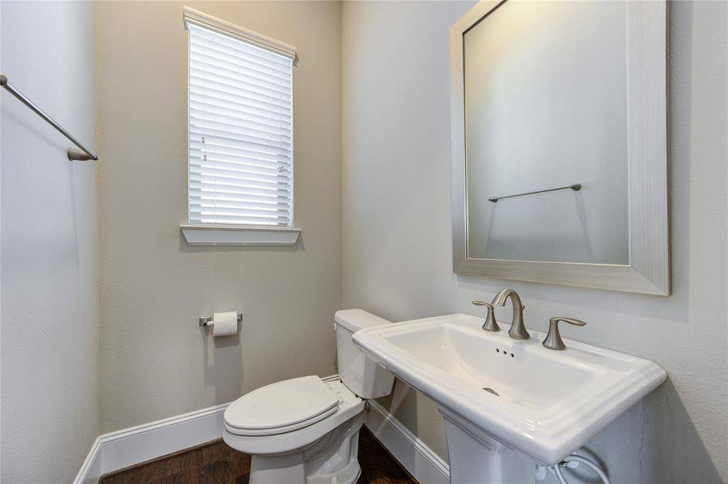 The location of the bedroom and garage down make this room perfect for next gen family members or for use as a home office/study or exercise, music or hobby room.