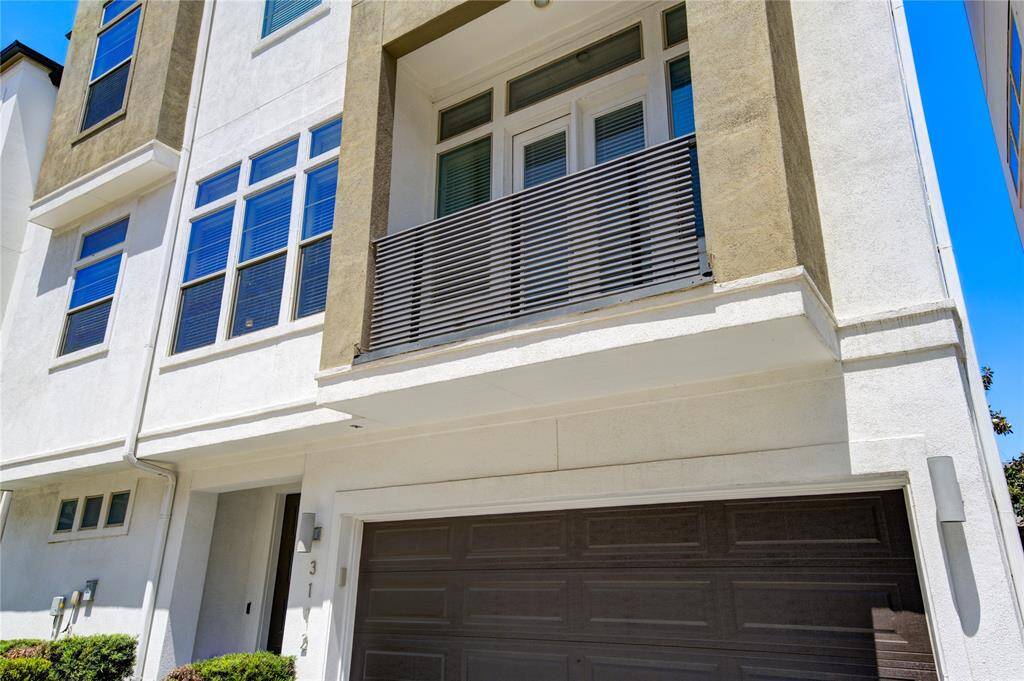 This second floor balcony is a great place to relax and enjoy some fresh air.