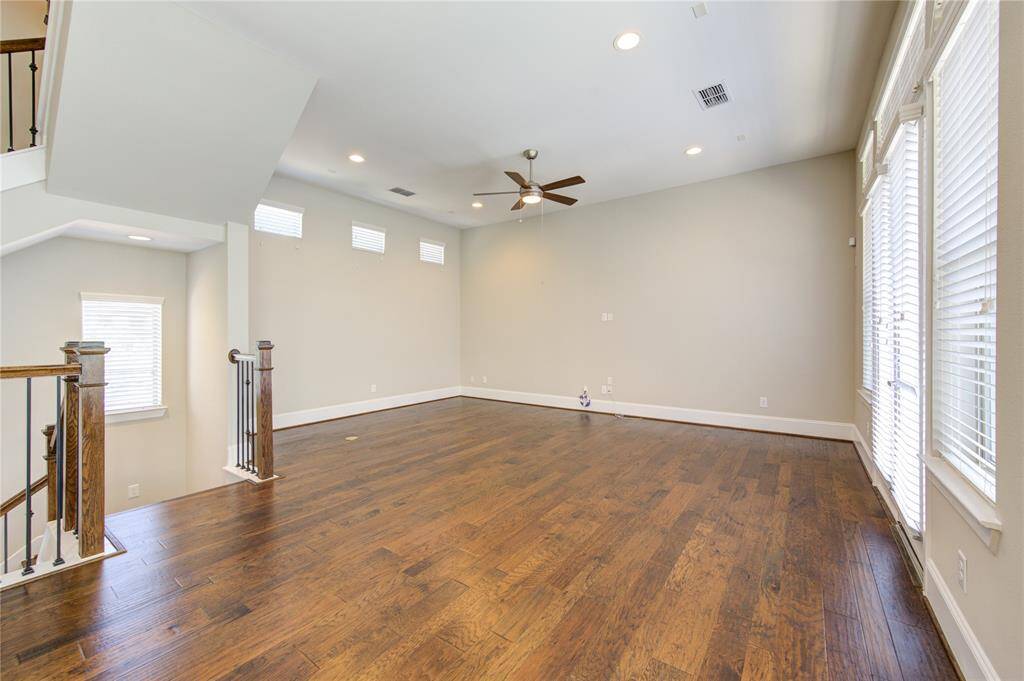 The 8" baseboards and hickory wood floors can be found throughout the residence.