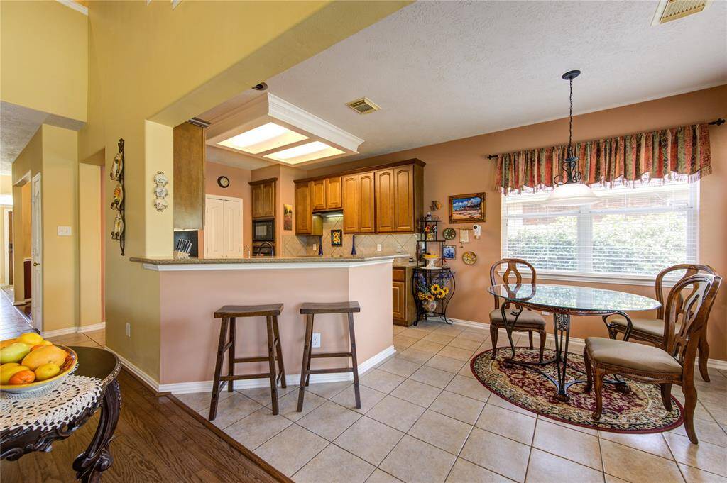 Breakfast area with a bar