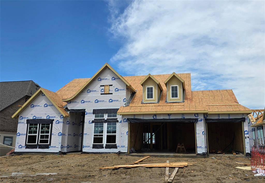 One story home with 4 bedrooms, 3.5 bathrooms, and 4 car tandem garage.