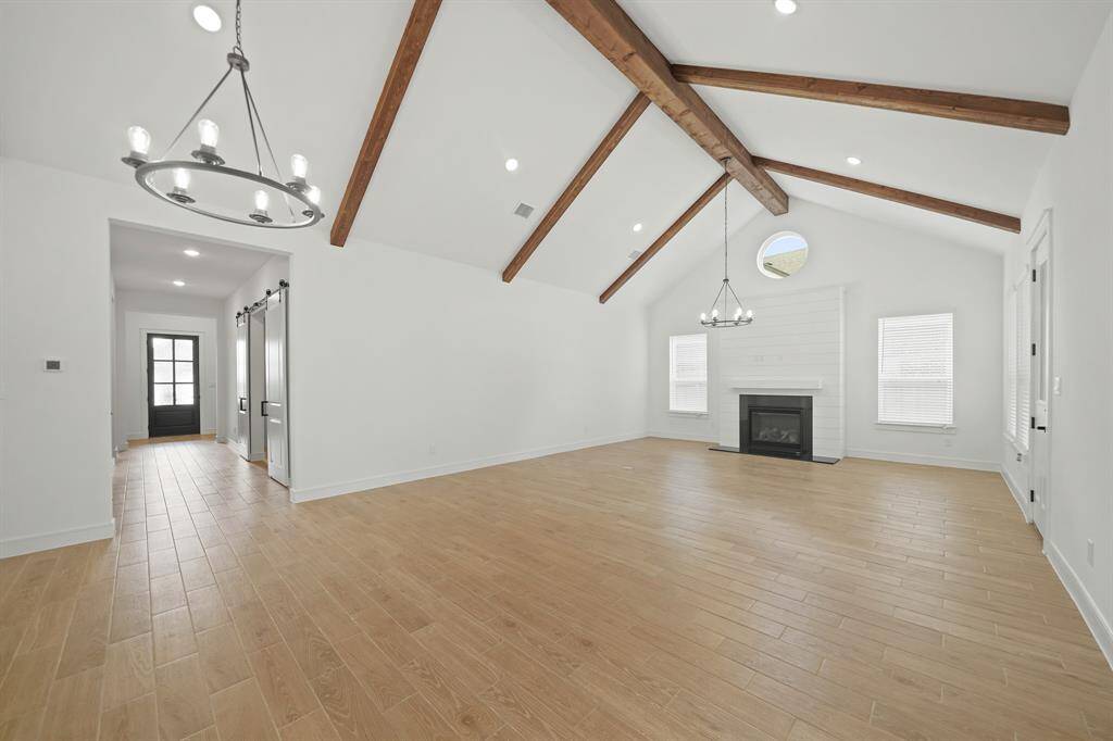 Fabulous great room with fireplace and high ceilings (*Photo not of actual home and used for illustration purposes only.)