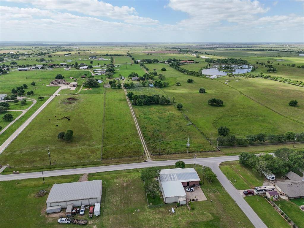 Bird’s-eye perspective highlights the defined boundaries and excellent road frontage—ready for agricultural or residential use.