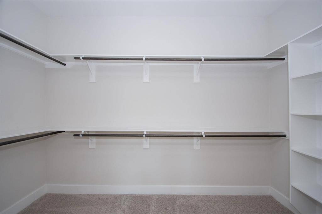 Large walk-in closet in primary bedroom