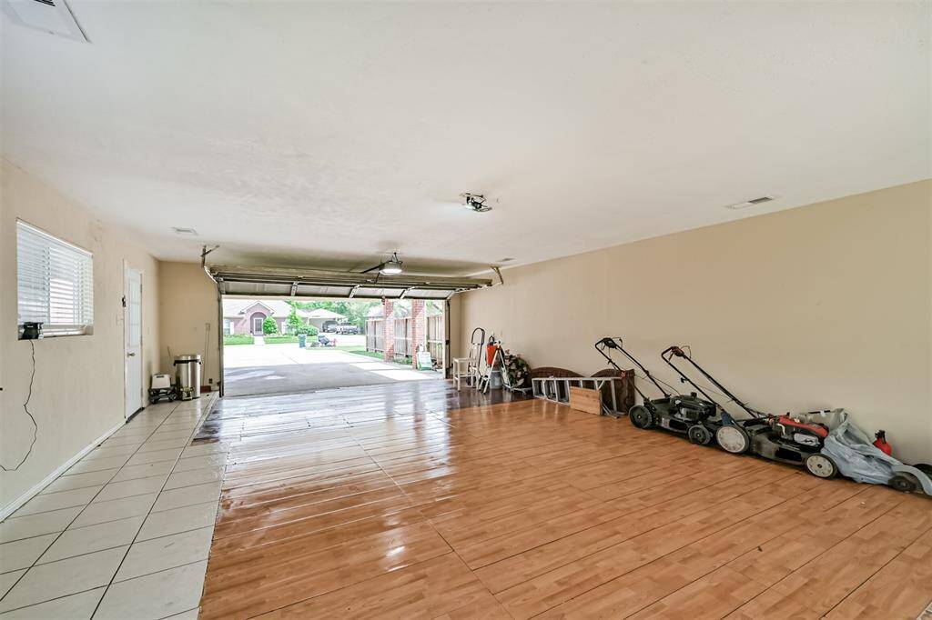 Over Sized Garage has central Air and Heat both upstairs and down.