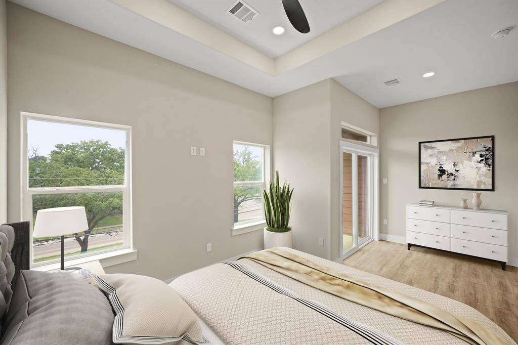 Virtually Staged: Another view of the Primary Bedroom showcases how spacious the room is.