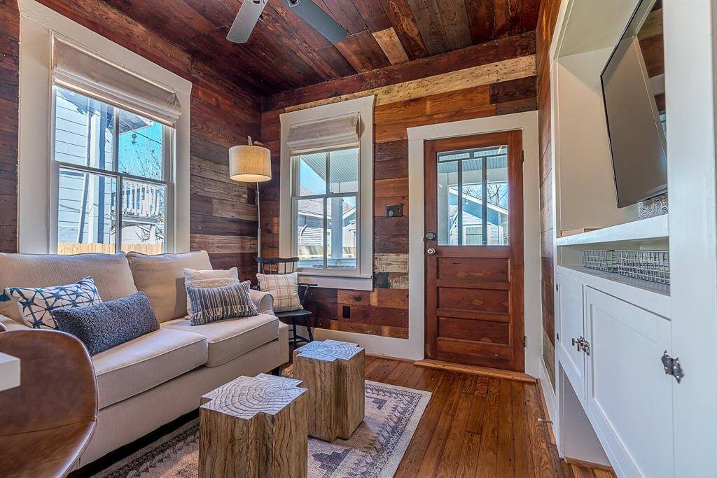 Back House:Enter from a covered front porch to original wood flooring throughout