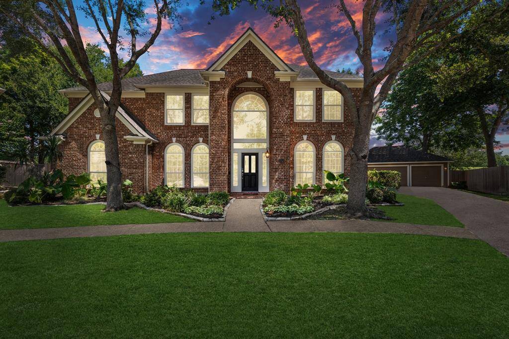 Hosting festivities is a cinch in the open floor plan of this stately 4,893 sqft home! Whether sampling the appetizers at the kitchen table or watching the game on the couch, guests seamlessly chat and mingle amongst each other.