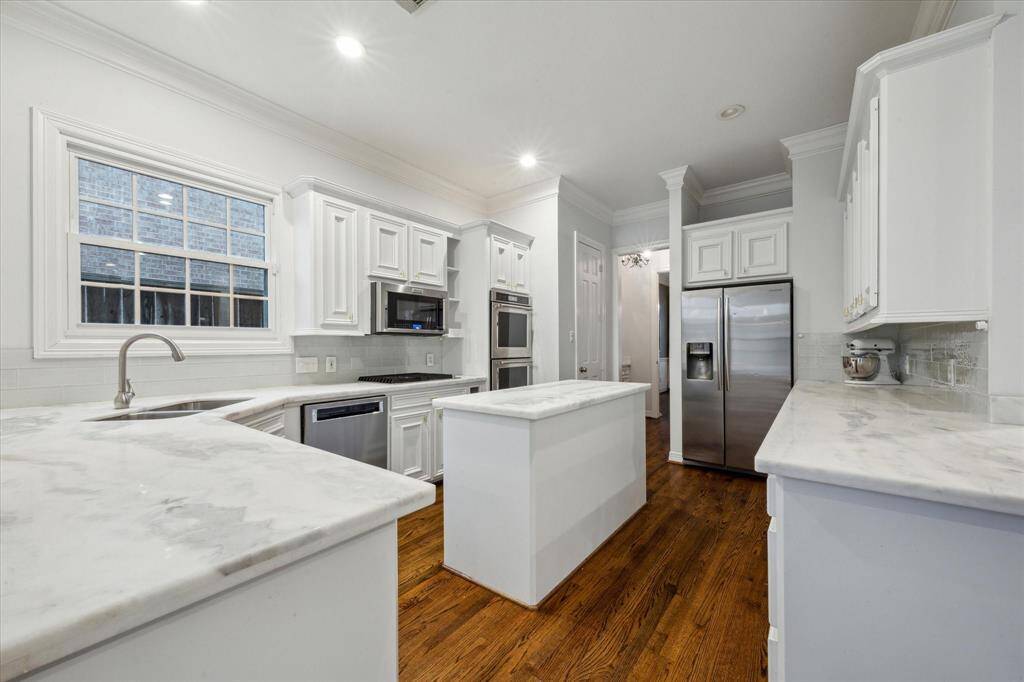 Fabulous kitchen featuring modern updates and exceptional design.