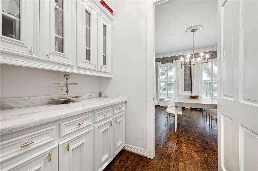 Butler's pantry seamlessly connecting the kitchen to the formal dining room