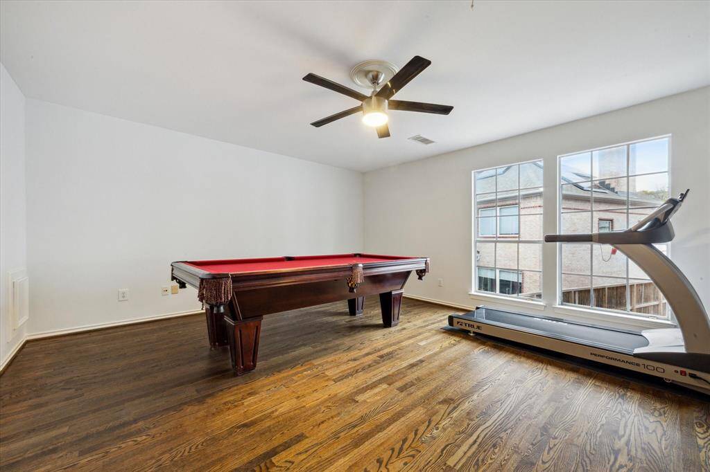 Expansive garage apartment featuring beautiful hardwood floors throughout.