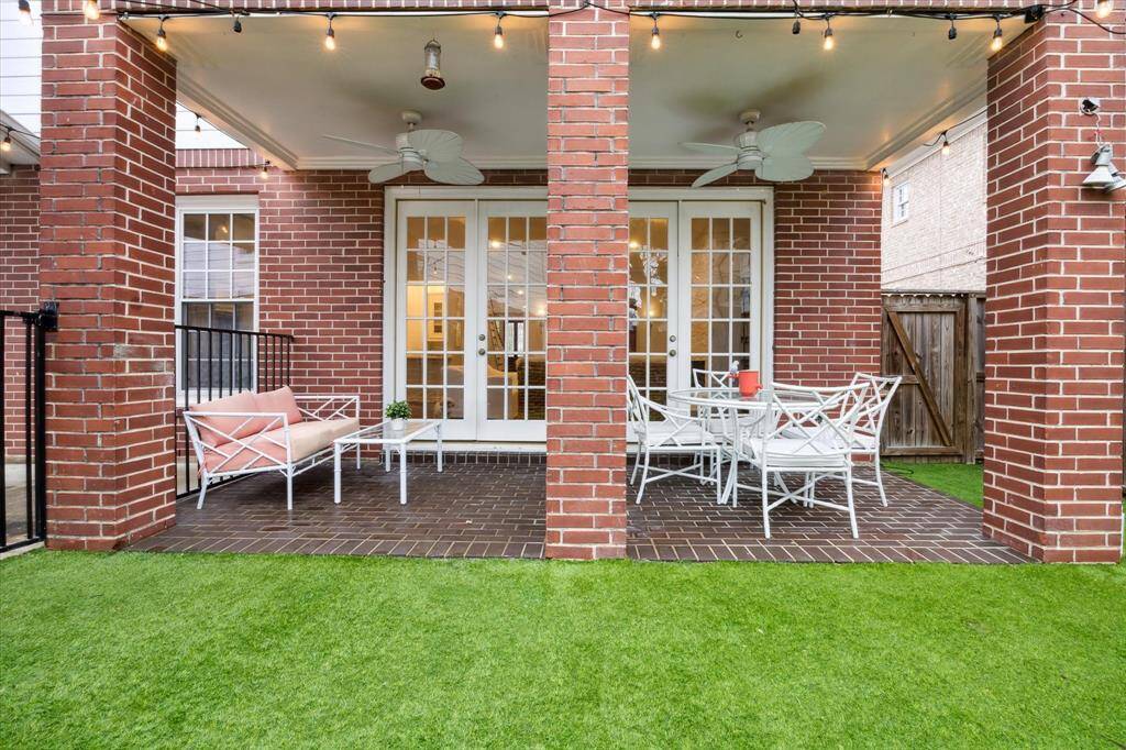 Covered patio off the main living room, perfect for relaxing and enjoying the outdoors.