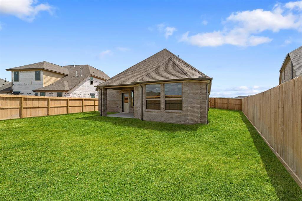 This backyard is perfect for family gatherings, social events, or simply unwinding in the fresh air.
