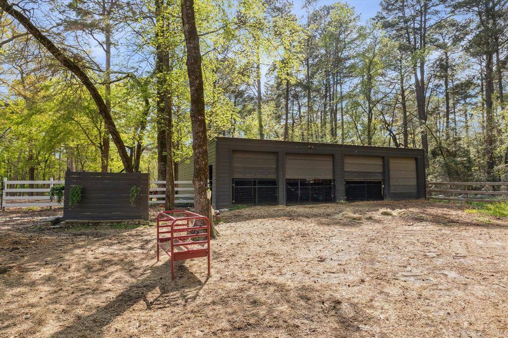 Additional barn and multiple stables for all your ranching needs.