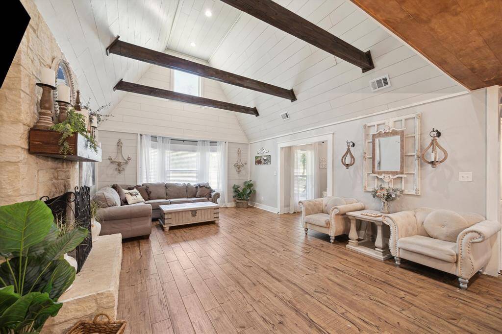 Tons of natural light in this living room!