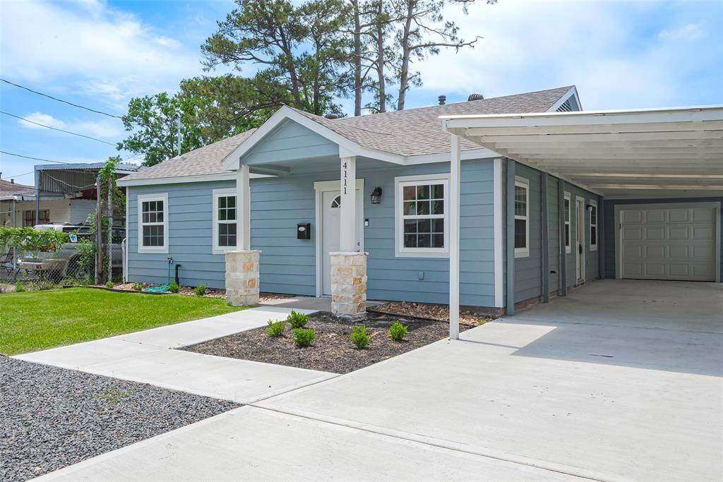 Welcome to your new home, featuring a charming walkway leading to the inviting front door.