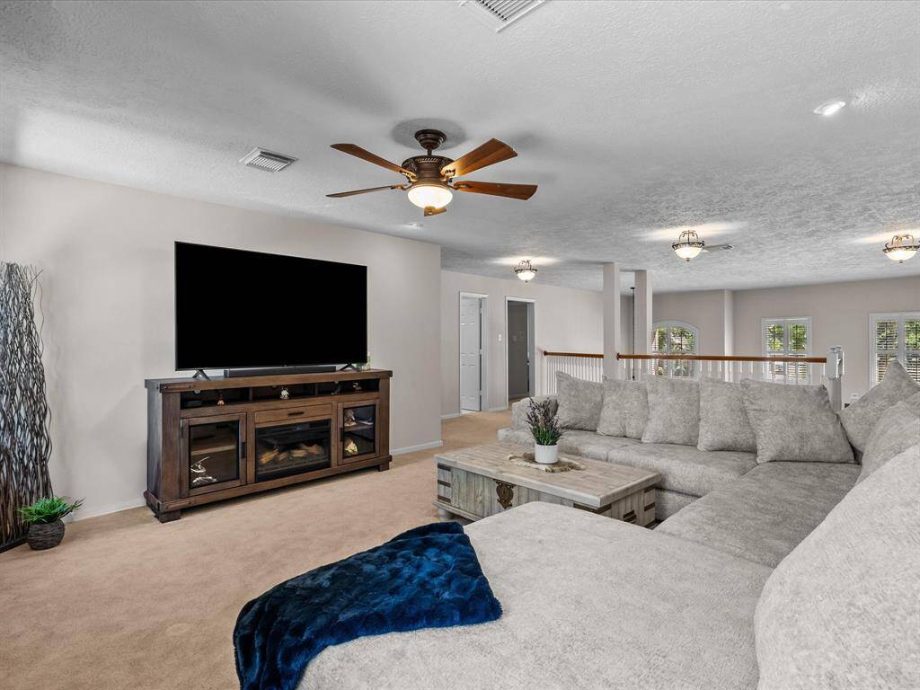 Upstairs you will find the loft/game room/movie room along with 3 bedrooms, and 2 full bathrooms