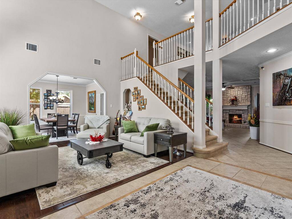 The entry opens up to your formal living space with soaring ceilings and natural light.