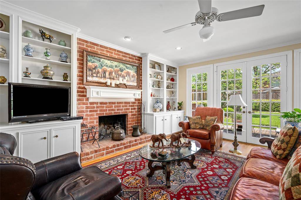 The den is light filled and bright with a great view of the spacious backyard.