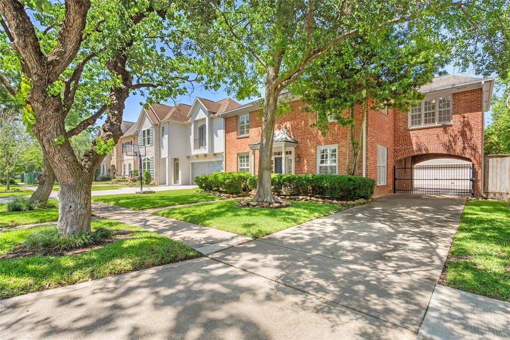 All brick traditional West U home.