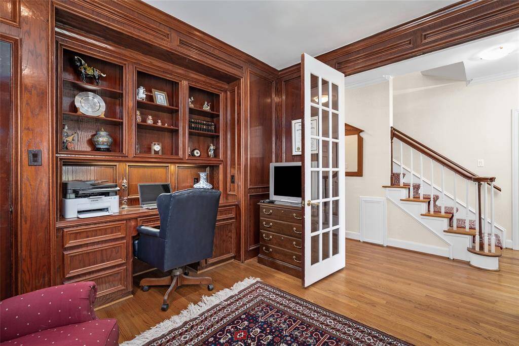 Additional view of the study with beautiful hardwood floors.