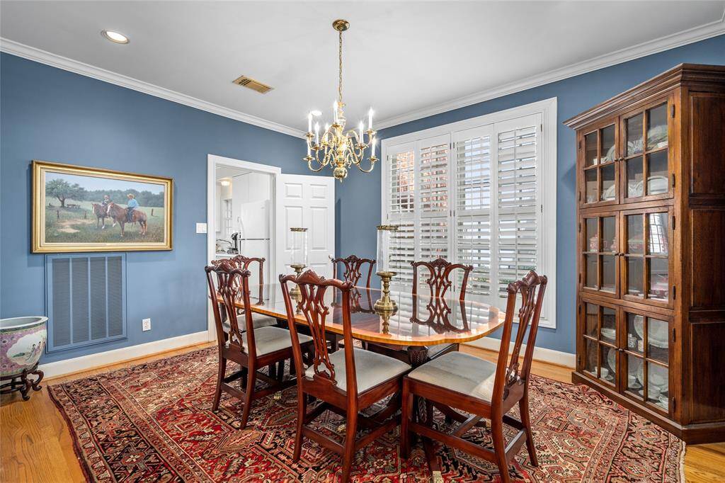 Formal dining room that leads to the kitchen.