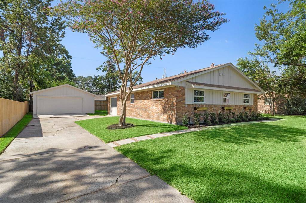 RARE OVERSIZED 2 car detached garage with additional space for storage. Long driveway with multiple spots for off street parking.