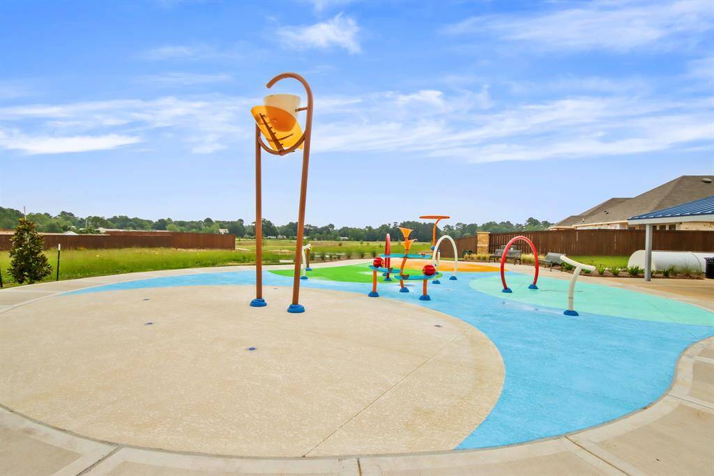 Our "Texas size" splash pad is a perfect place to cool off on the hot summer days!