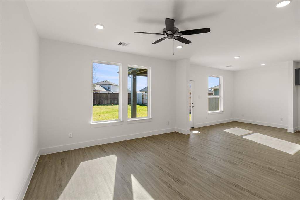 Picture expansive windows that invite natural light to dance through spacious living areas, creating a welcoming atmosphere perfect for gatherings or quiet moments of reflection.