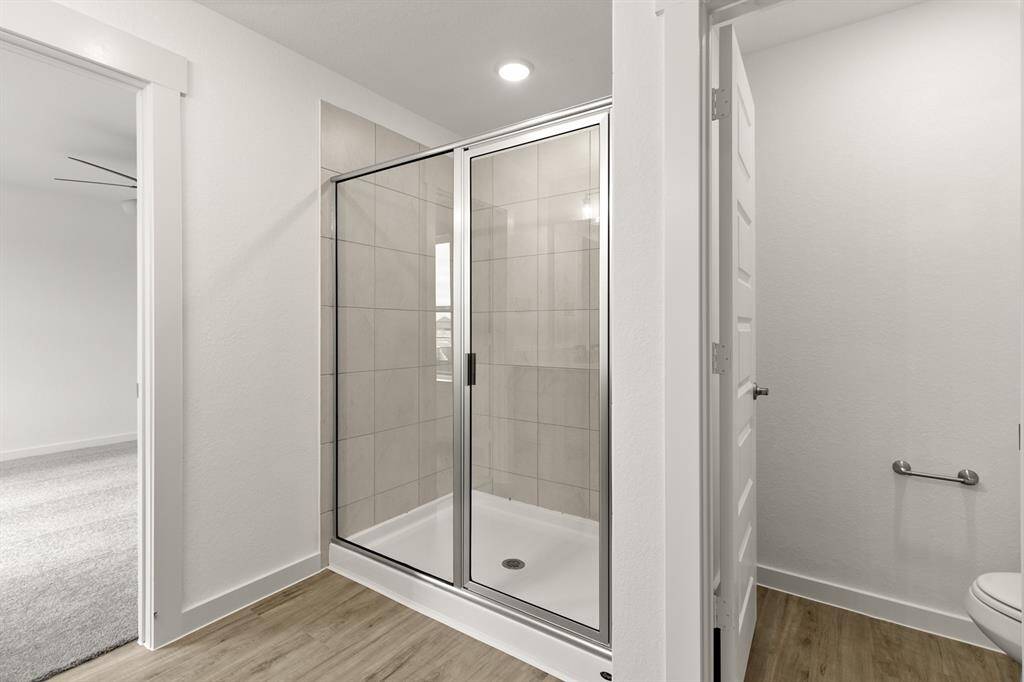 Rinse off the stresses and worries of your day in this oversized shower.