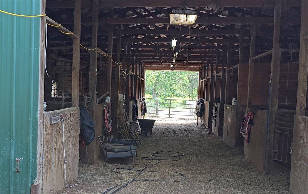 1st barn has 2 tack rooms, 1 bathroom, 6 stalls