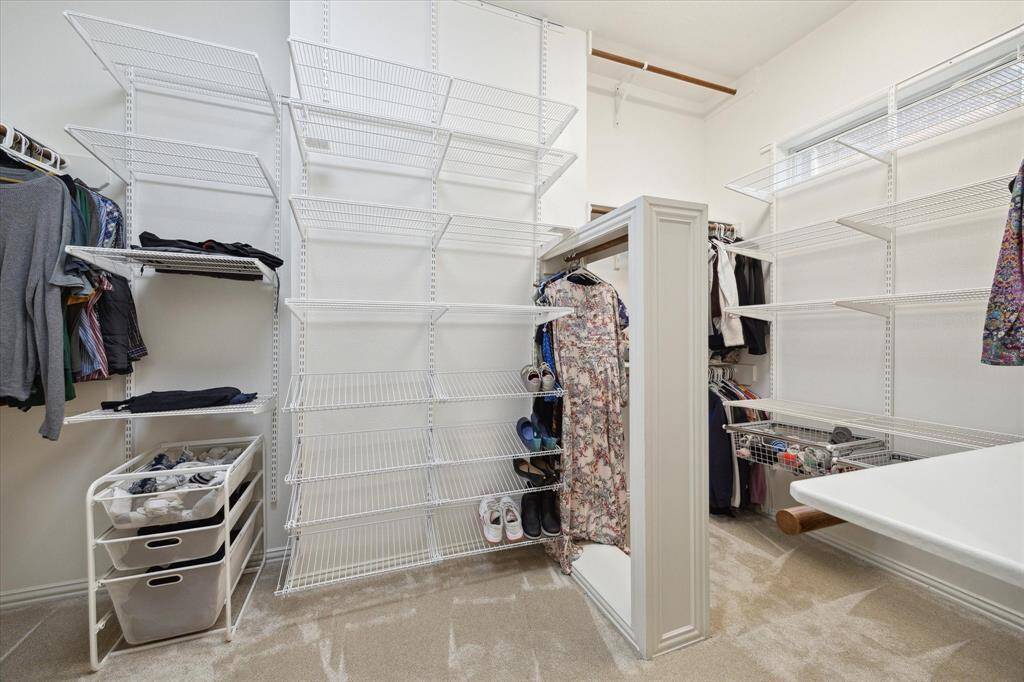 Spacious Gameroom with built-ins and a study area.