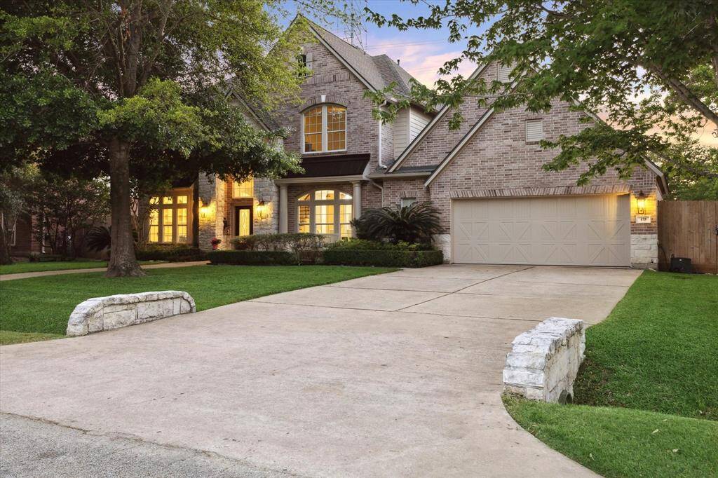 Upon entry into the home, you are greeted by a beautiful staircase with a study on the left and the formal dining room on your right.