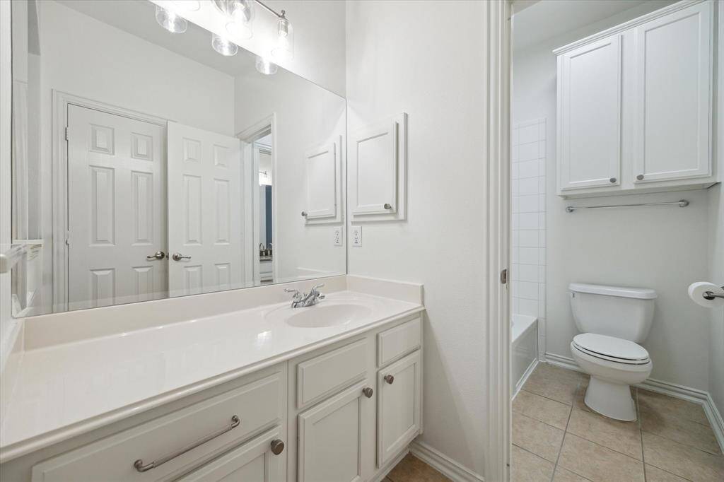 Secondary bathroom is easily accessible from the game room and 4th bedroom.