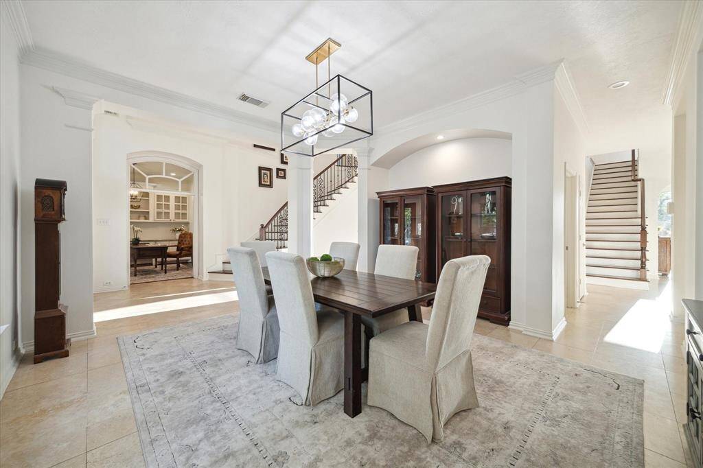 The Living Room has a vaulted ceilings, a fireplace and built in bookcase and overlooks the backyard.