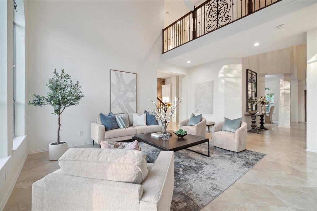 The Kitchen is open and has tons of light. It has a sitting area and a room for breakfast table. The kitchen overlooks the backyard and pool.
