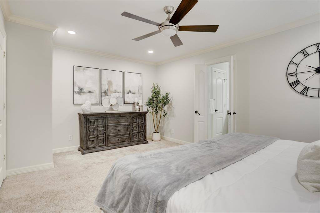 An expanded nook in the primary bedroom offers space for a dresser, home office, or space to expand the closet.