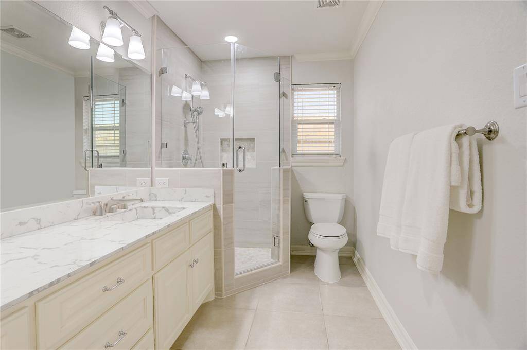 Another angle of the primary bathroom with the new, virtually generated counter top.