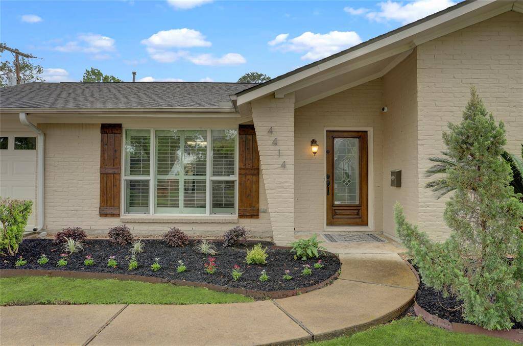 The front elevation of this ranch-style home is inviting and clean.