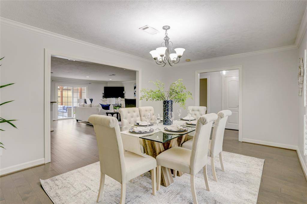 Facing the front of the house is a massive formal dining area. If a less formal space is needed, this room is convertible into a number of other uses.