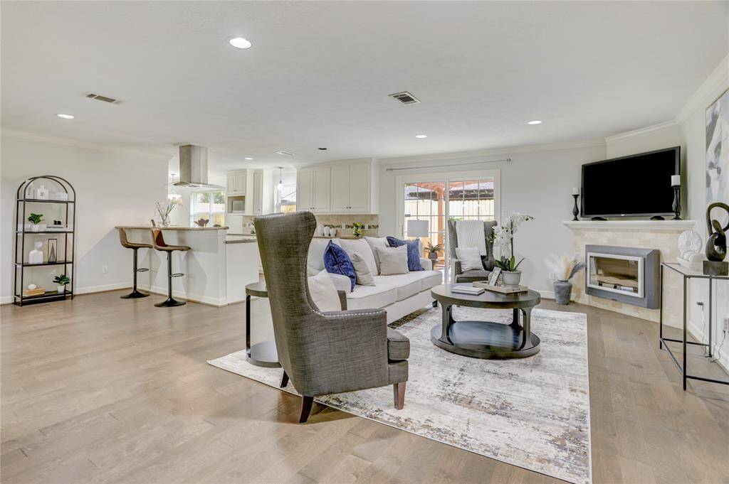 The open living/kitchen offers ample space to spread out or entertain.