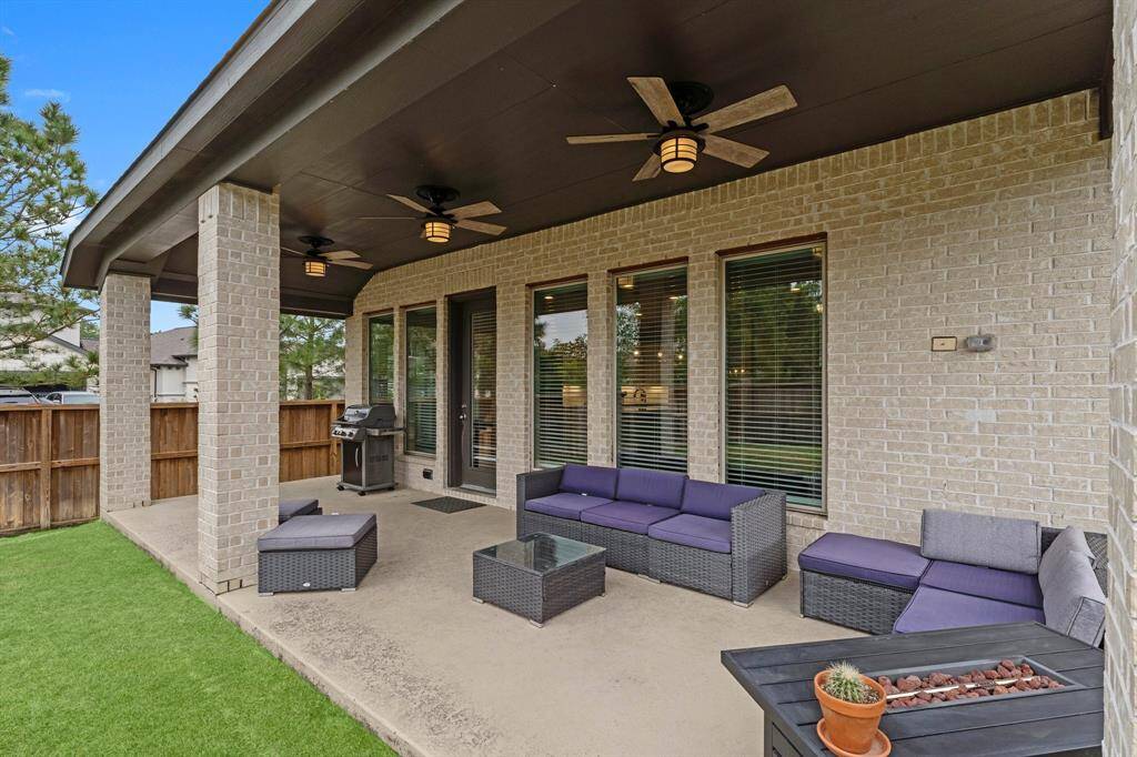 Expansive covered patio with upgraded fans!