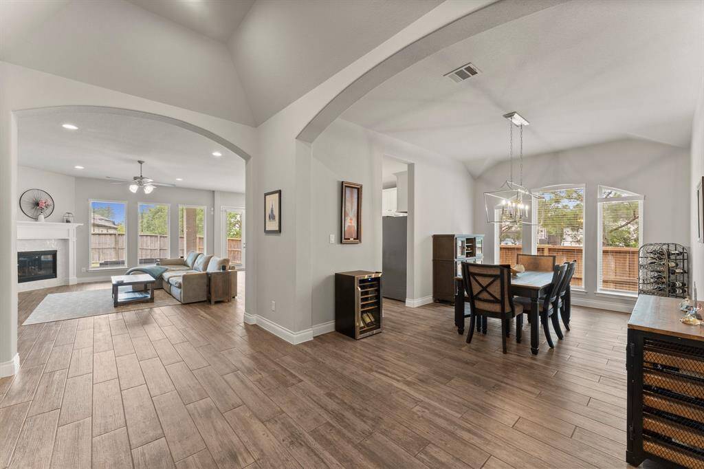 Formal dining is nicely sized and features pass through to the kitchen